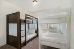 The Little Ones are Sure to Sleep Soundly in Casa Blanca`s Kids` Suite, Equipped with Two Twin-Over-Full Bunk Beds for a Cozy and Playful Retreat
